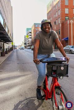 Elese Daniel riding a bicycle